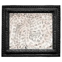 a black frame with an ornate pattern on it